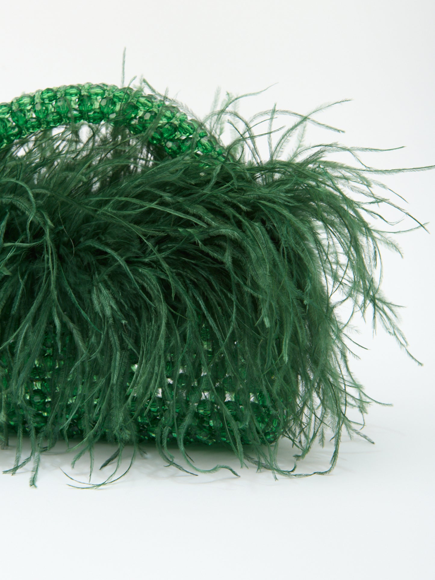 FEATHER TOP HANDLE in dark green beaded crystals
