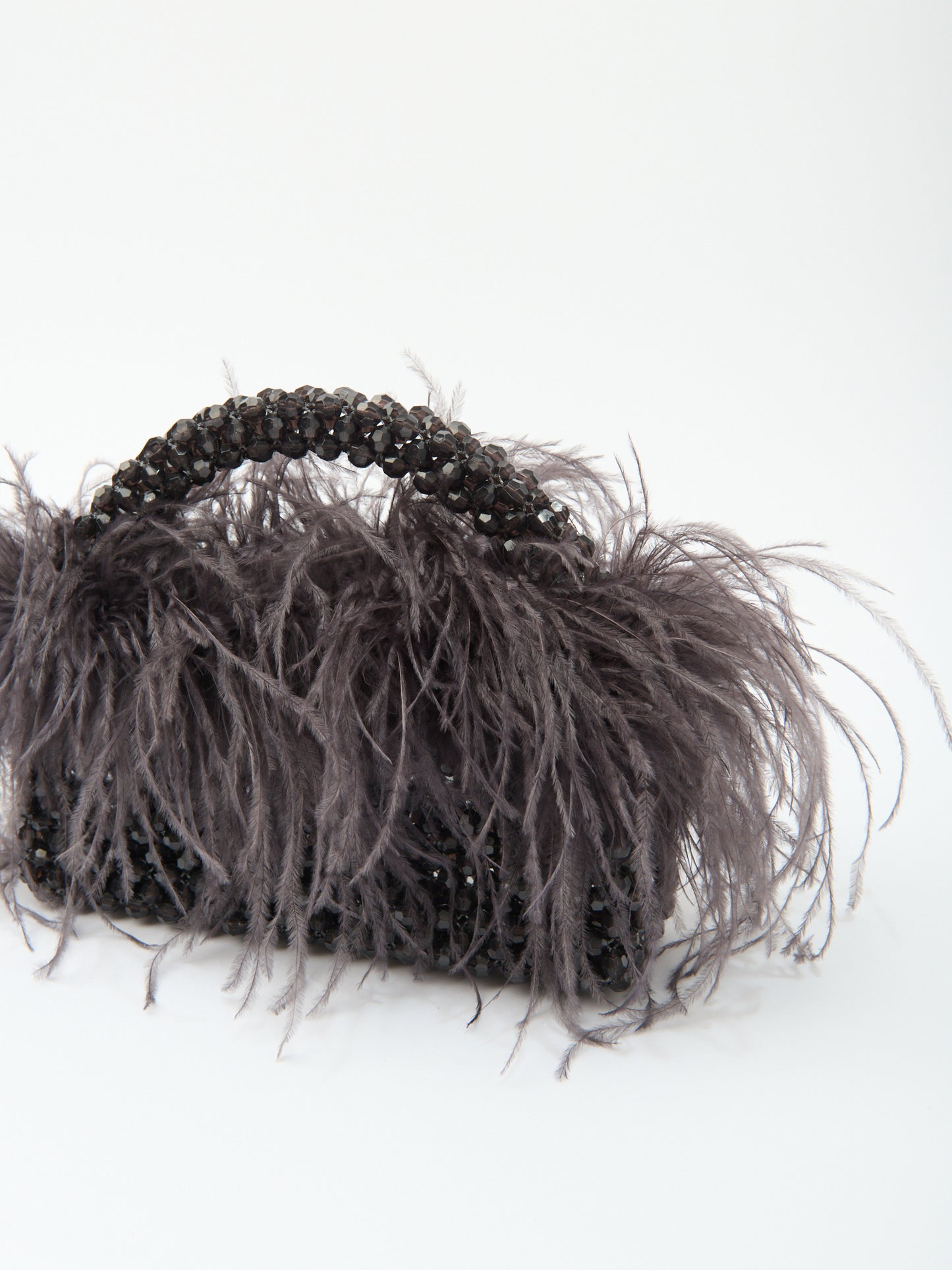 FEATHER TOP HANDLE in dark grey beaded crystals
